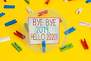 Conceptual hand writing showing Bye Bye 2019 Hello 2020. Business photo showcasing saying goodbye to last year and