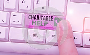 Conceptual hand writing showing Charitable Help. Business photo showcasing system of giving money or help free to those who are in