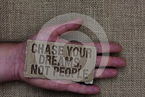 Conceptual hand writing showing Chase Your Dreams, Not People. Business photo text Do not follow others chasing goals objectives C