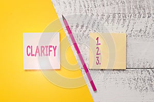Conceptual hand writing showing Clarify. Business photo showcasing Make a statement or situation less confused and more