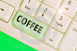 Conceptual hand writing showing Coffee. Business photo showcasing hot drink made from the roasted and ground seeds of a tropical