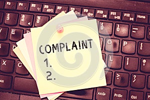 Conceptual hand writing showing Complaint. Business photo text statement that something is unsatisfactory or