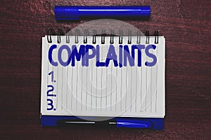 Conceptual hand writing showing Complaints. Business photo text Statement that something is unsatisfactory or