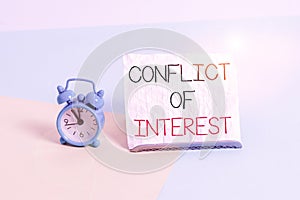 Conceptual hand writing showing Conflict Of Interest. Business photo text disagreeing with someone about goals or