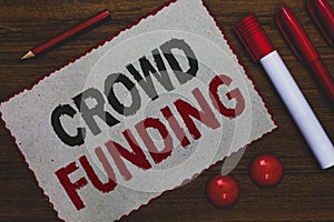 Conceptual hand writing showing Crowd Funding. Business photo showcasing Fundraising Kickstarter Startup Pledge Platform Donations