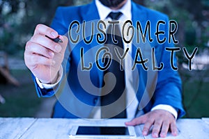 Conceptual hand writing showing Customer Loyalty. Business photo text customers are devoted to a company s is products