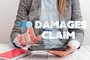 Conceptual hand writing showing Damages Claim. Business photo showcasing Deanalysisd Compensation Litigate Insurance