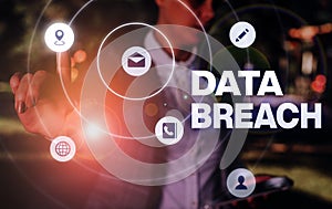 Conceptual hand writing showing Data Breach. Business photo showcasing security incident where sensitive protected information