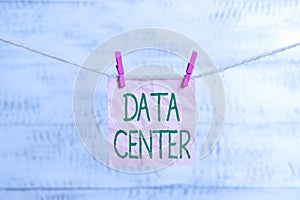 Conceptual hand writing showing Data Center. Business photo showcasing a repository that houses computing facilities like servers