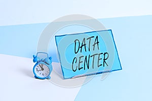 Conceptual hand writing showing Data Center. Business photo showcasing a repository that houses computing facilities like servers