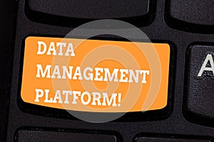 Conceptual hand writing showing Data Management Platform. Business photo text Type of centralized tech platform that gathers data