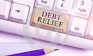 Conceptual hand writing showing Debt Relief. Business photo showcasing a reduction in the amount of debt that a country