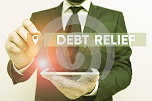 Conceptual hand writing showing Debt Relief. Business photo text a reduction in the amount of debt that a country has to