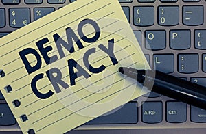 Conceptual hand writing showing Demo Cracy. Business photo showcasing freedom of the people to express their feelings and beliefs