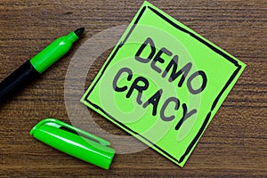 Conceptual hand writing showing Demo Cracy. Business photo showcasing freedom of the people to express their feelings and beliefs