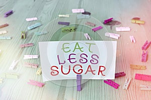 Conceptual hand writing showing Eat Less Sugar. Business photo showcasing reducing sugar intake and eating a healthful