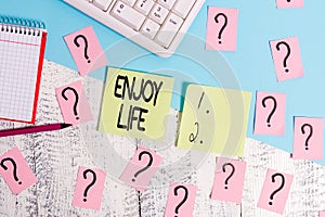 Conceptual hand writing showing Enjoy Life. Business photo text Any thing, place,food or demonstrating, that makes you