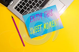 Conceptual hand writing showing Enjoy This Sweet Moment. Business photo showcasing encouraging someone to love his life