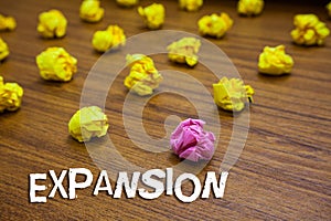 Conceptual hand writing showing Expansion. Business photo showcasing action becoming larger or more extensive