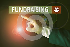 Conceptual hand writing showing Fundraising. Business photo showcasing seeking to generate financial support for charity