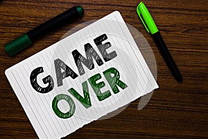 Conceptual hand writing showing Game Over. Business photo text A situation in a particular sport that reach his finals or ending N