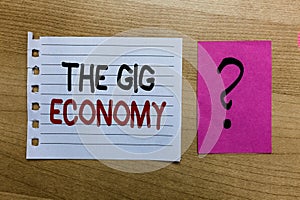 Conceptual hand writing showing The Gig Economy. Business photo text Market of Short-term contracts freelance work temporary white