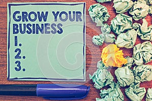 Conceptual hand writing showing Grow Your Business. Business photo showcasing Achieve higher profit Provide better return of inves
