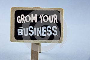 Conceptual hand writing showing Grow Your Business. Business photo showcasing improve your work enlarge company overcome competito