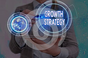 Conceptual hand writing showing Growth Strategy. Business photo text Strategy aimed at winning larger market share in shortterm