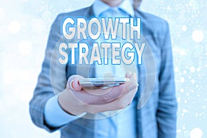 Conceptual hand writing showing Growth Strategy. Business photo showcasing Strategy aimed at winning larger market share in photo