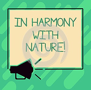 Conceptual hand writing showing In Harmony With Nature. Business photo text Meditation zen peaceful attitude photo