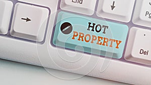 Conceptual hand writing showing Hot Property. Business photo text one that many showing want to buy and it is highly desirable