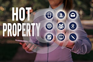 Conceptual hand writing showing Hot Property. Business photo text Something which is sought after or is Heavily