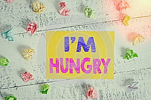 Conceptual hand writing showing I M Hungry. Business photo showcasing having a strong wish or desire for something to put on