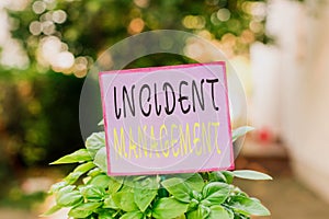 Conceptual hand writing showing Incident Management. Business photo showcasing Activities of a company to identify and