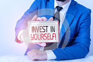 Conceptual hand writing showing Invest In Yourself. Business photo showcasing learn new things or materials thus making