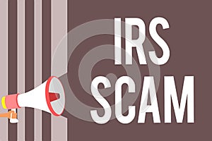 Conceptual hand writing showing Irs Scam. Business photo showcasing targeted taxpayers by pretending to be Internal Revenue Servic