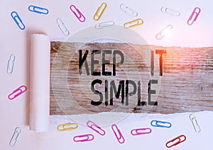 Conceptual hand writing showing Keep It Simple. Business photo showcasing Remain in the simple place or position not