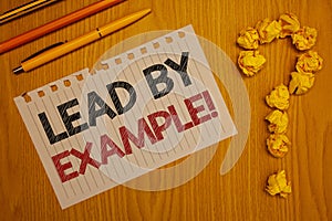 Conceptual hand writing showing Lead By Example Motivational Call. Business photo text Leadership Management Mentor Organization W