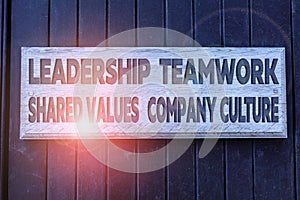 Conceptual hand writing showing Leadership Teamwork Shared Values Company Culture. Business photo text Group Team