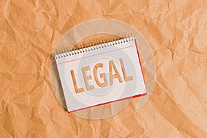 Conceptual hand writing showing Legal. Business photo showcasing Allowable or enforceable by being in conformity with the law