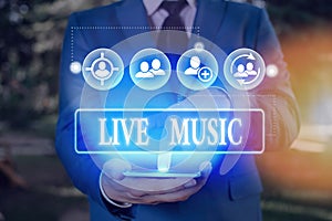 Conceptual hand writing showing Live Music. Business photo showcasing performance given by one or more singers or instrumentalists photo