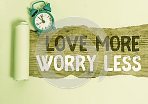 Conceptual hand writing showing Love More Worry Less. Business photo text Have a good attitude motivation be lovable