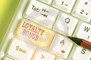 Conceptual hand writing showing Loyalty Bonus. Business photo showcasing reward such as money or points is given for a loyal