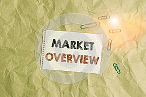 Conceptual hand writing showing Market Overview. Business photo showcasing brief synopsis of a commercial or industrial market