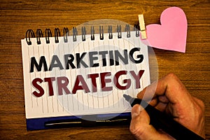 Conceptual hand writing showing Marketing Strategy. Business photo text Plan Formula Creativity Research Organization Human hand r