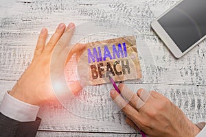 Conceptual hand writing showing Miami Beach. Business photo showcasing the coastal resort city in MiamiDade County of