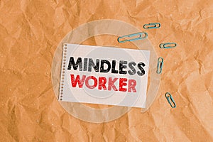 Conceptual hand writing showing Mindless Worker. Business photo showcasing Having no intelligent purpose Showing little attention