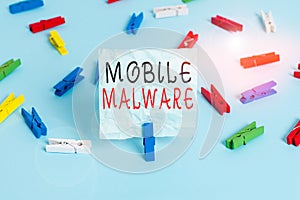 Conceptual hand writing showing Mobile Malware. Business photo text malicious software written to attack mobile devices Colored