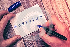 Conceptual hand writing showing Momentum. Business photo showcasing quantity of motion of moving measured as product